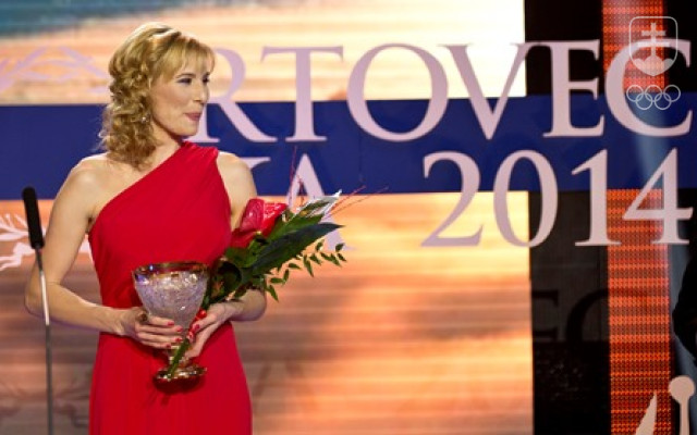 Biatlonistka Anastasia Kuzminová vyhrala anketu Športovec roka trikrát – vždy v roku svojho olympijského víťazstva. Na fotografii je zo slávnosti v roku 2014.