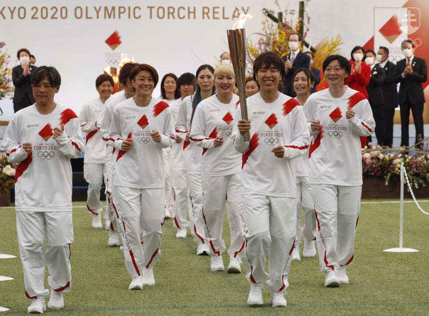 Momentka zo začiatku štafety s olympijským ohňom po japonskom území, ktorá odštartovala vo štvrtok vo Fukušime.